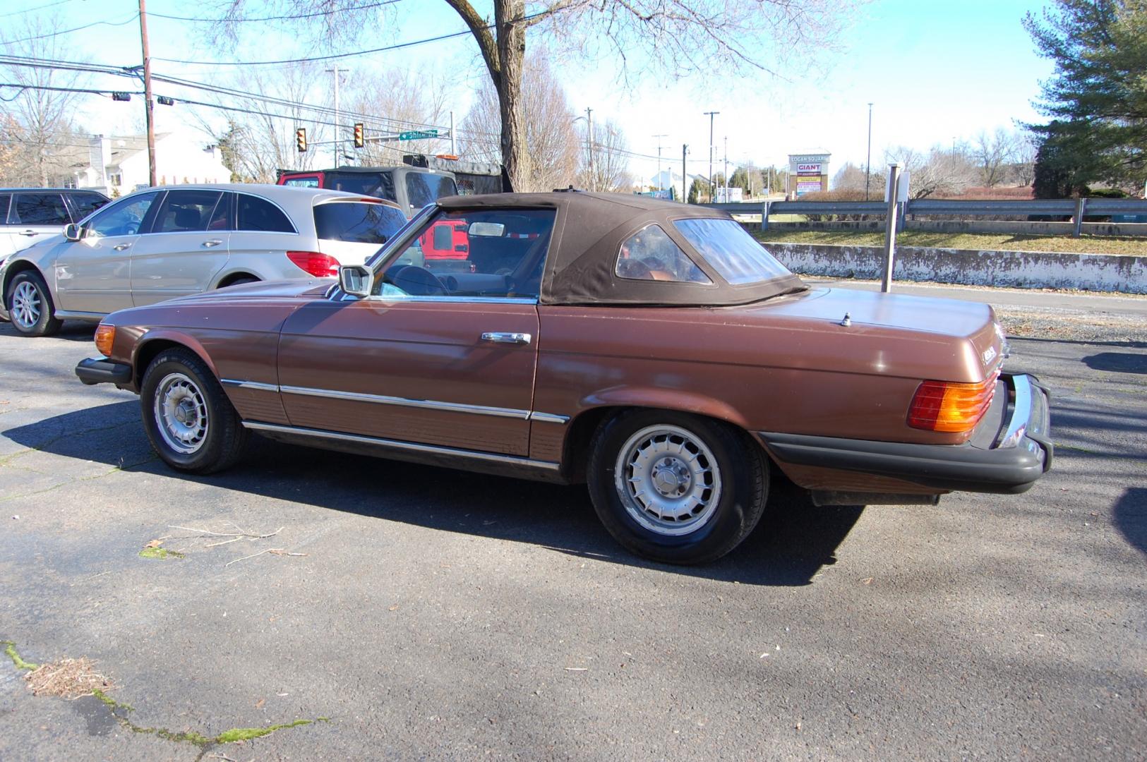 1976 Brown /Brown Leather Mercedes-Benz 450SL (10704412030) with an 4.5L V8 engine, Automatic transmission, located at 6528 Lower York Road, New Hope, PA, 18938, (215) 862-9555, 40.358707, -74.977882 - Here we have a nice 1976 Mercedes 450SL convertible with a 4.5L V8 engine putting power to the rear wheels via an automatic transmission. Some options on this vehicle include brown leather, wood trim, power windows, removable hard top, heat, A/C, AM/FM radio, cruise control, wood steering wheel, 14 - Photo#1